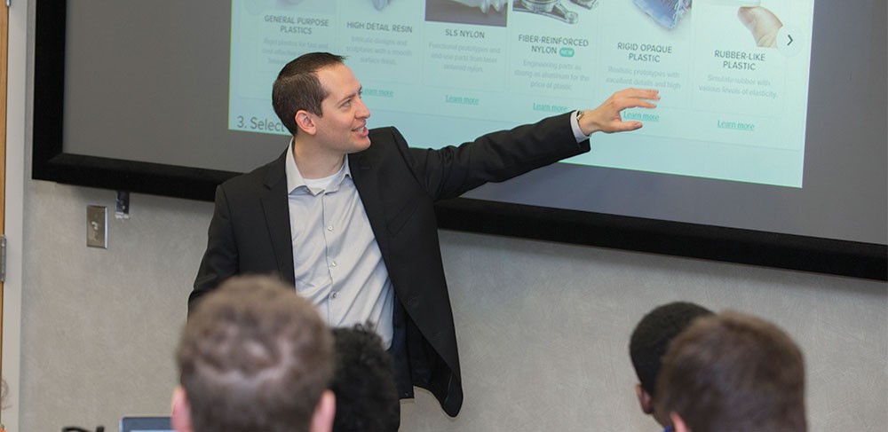 Portfolio 2018, Boyd Award: Elliott Manzon Professor Elliott Manzon presenting to students