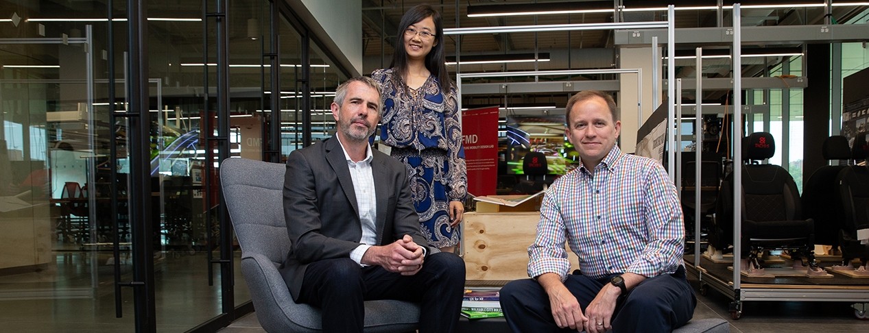 Mike Fry, Liwei Chen and Craig Froehle pose for a picture in Digital Futures.